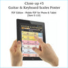 Close-up of guitar scales and piano scales pdf chart on a tablet screen.